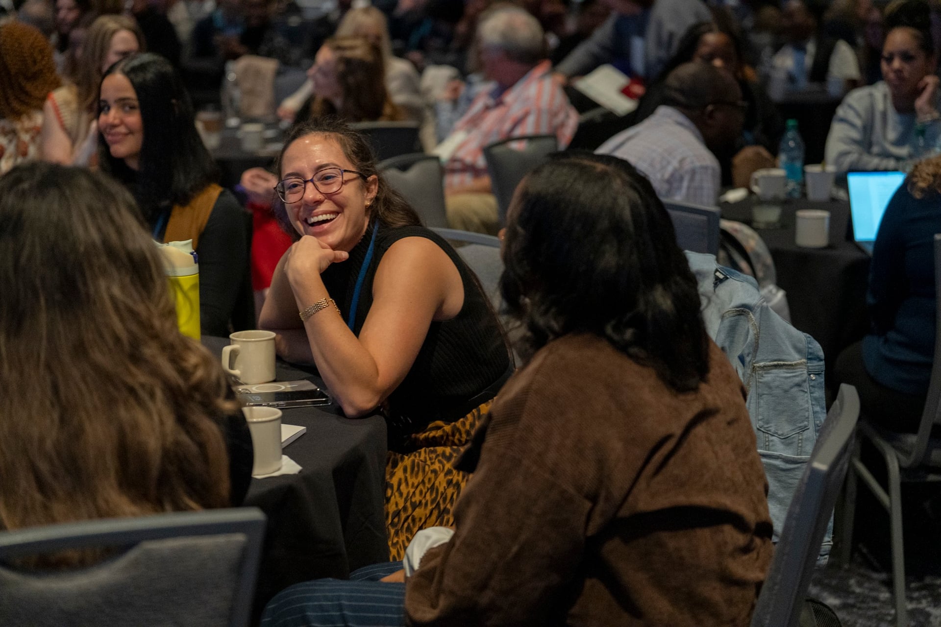 Conference attendees networking at a Portland corporate event photographed by MAGNIFY Photo